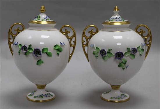A pair of Thomas Goode floral encrusted vases, height 22cm